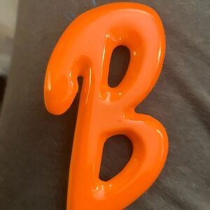 Initial vintage B celluloid pin brooch, orange